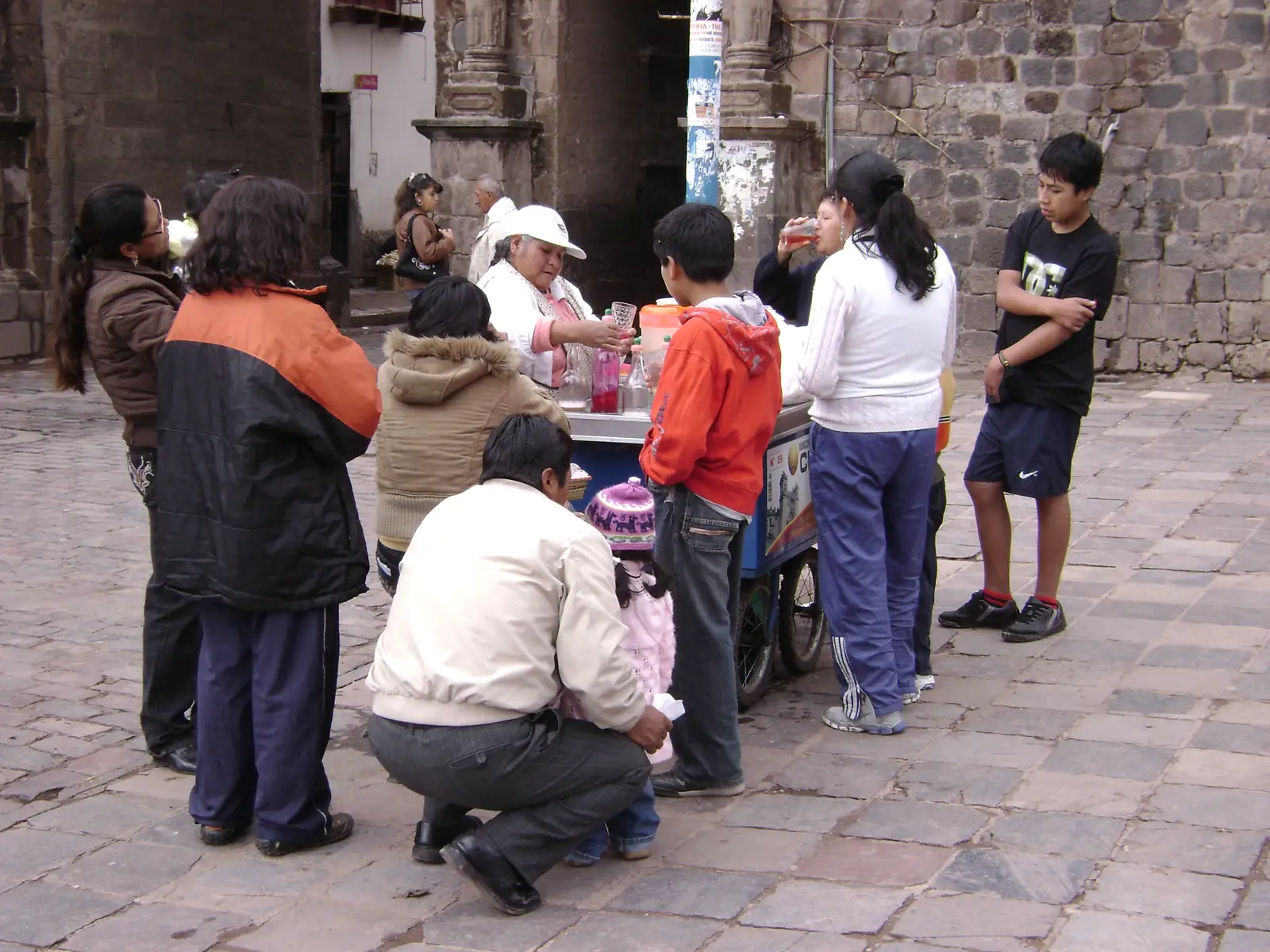 Street vendor serving emoliente in Cusco, Peru